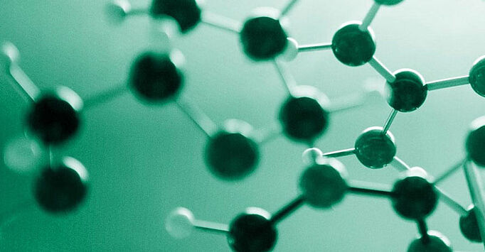 Moléculas químicas sobre fondo verde