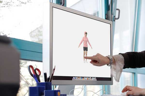 Diseñador digital de Hohenstein apuntando a un avatar apropiado en una pantalla